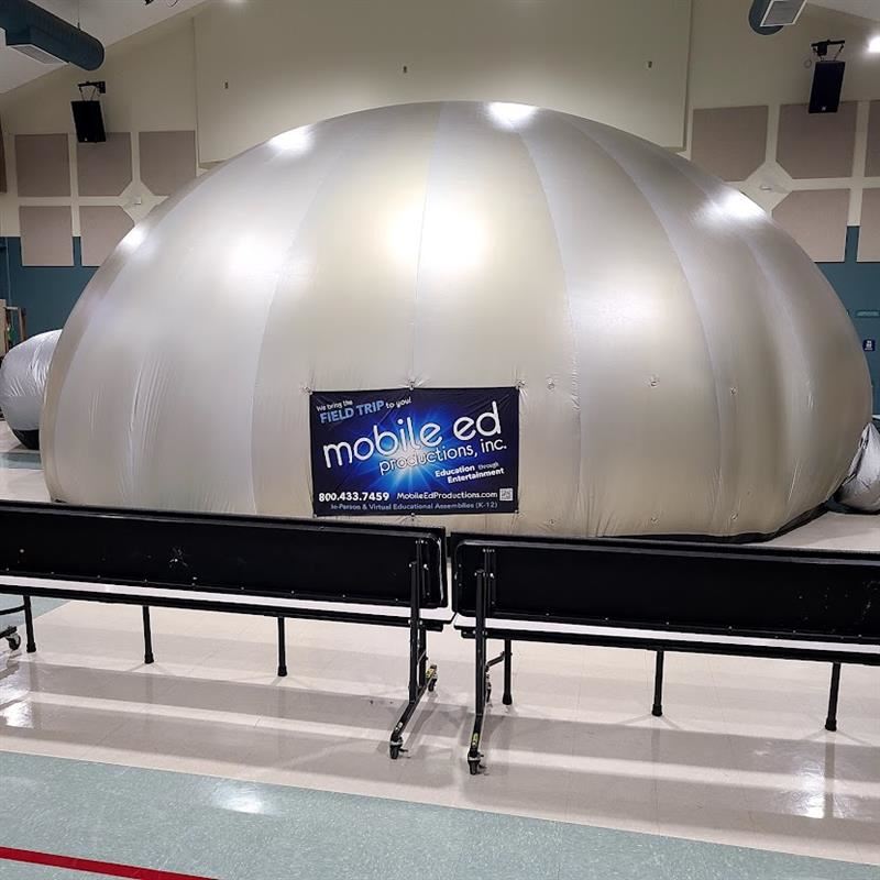  Inflated indoor mobile planitarium. silver round dome